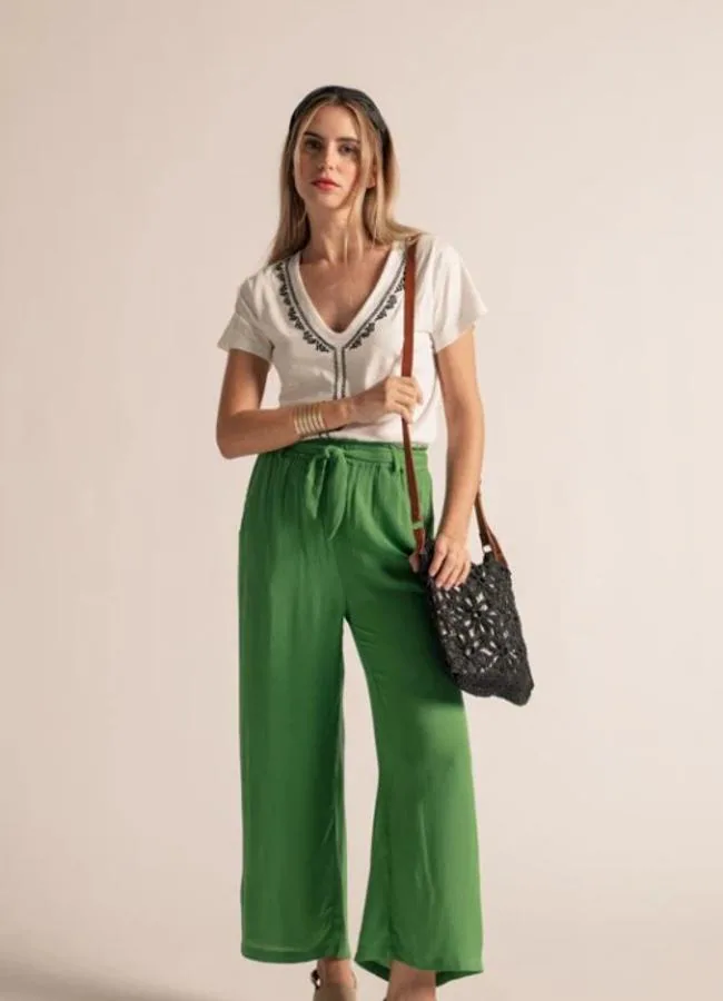 Pantalón de color verde de Hug & Clau.