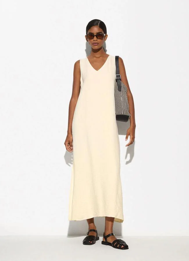 Vestido amarillo mantequilla de Parfois, 27,99 euros.