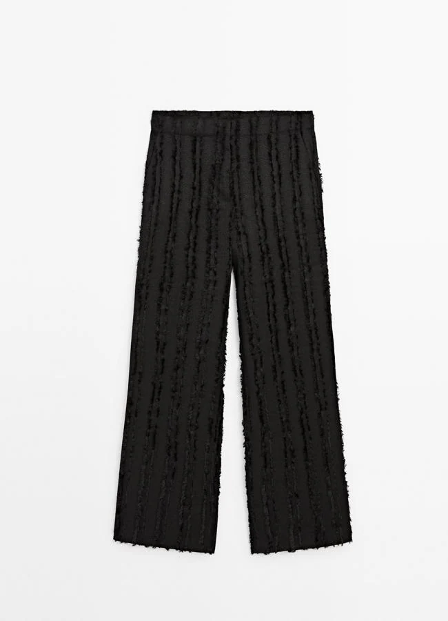 Pantalón con detalles de Massimo Dutti, 79,95 euros.