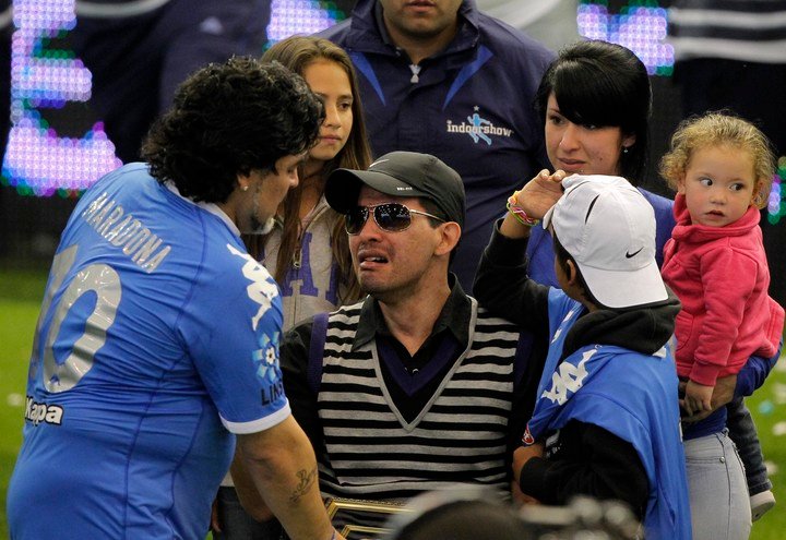 Diego Maradona y Fernando Cáceres en 2010.