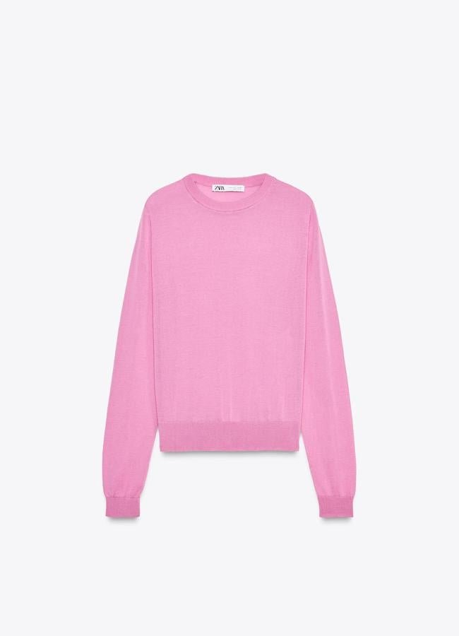 Jersey finito en rosa de Zara (22,95 euros).
