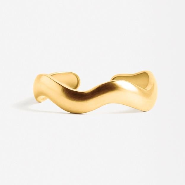 Pulsera rígida con ondas baño de oro 18K (29,99€)