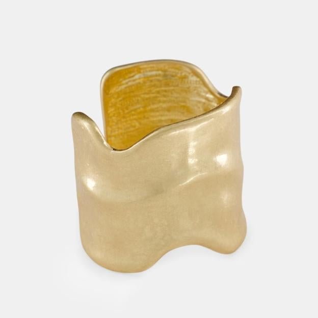 Brazalete abierto de mujer (19,99€ en El Corte Inglés)