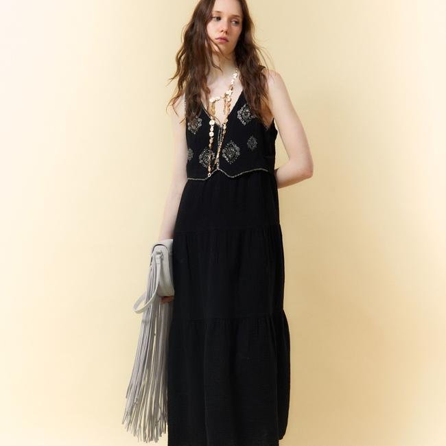 Vestido con chaleco de brillos