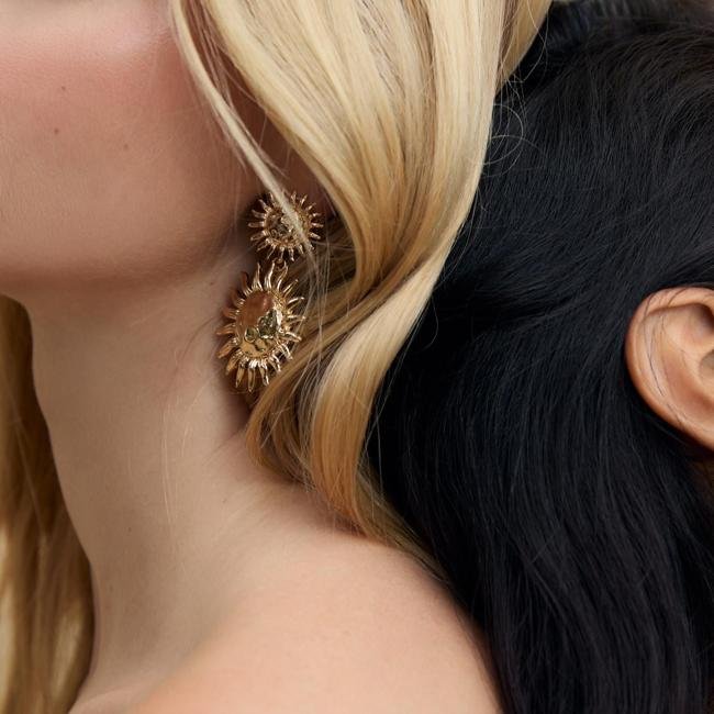 Pendientes metálicos con forma de sol