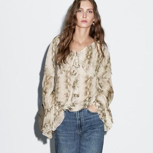 Blusa animal print de serpiente