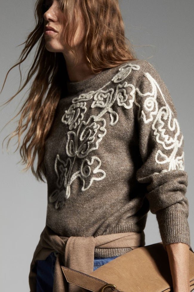 Jersey con flores de Sfera (35,99 euros)