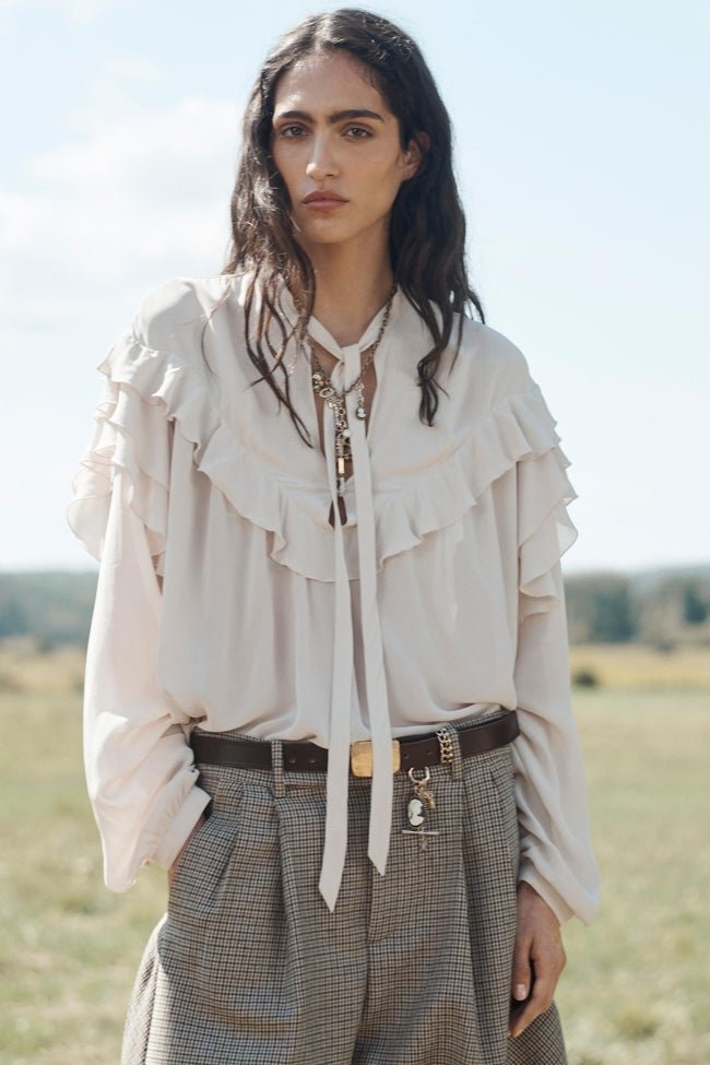 Camisa con volantes de Zara (59,99 euros)