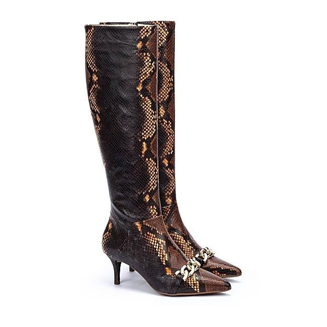 Botas estampadas efecto serpiente de Martinelli, 120 euros.