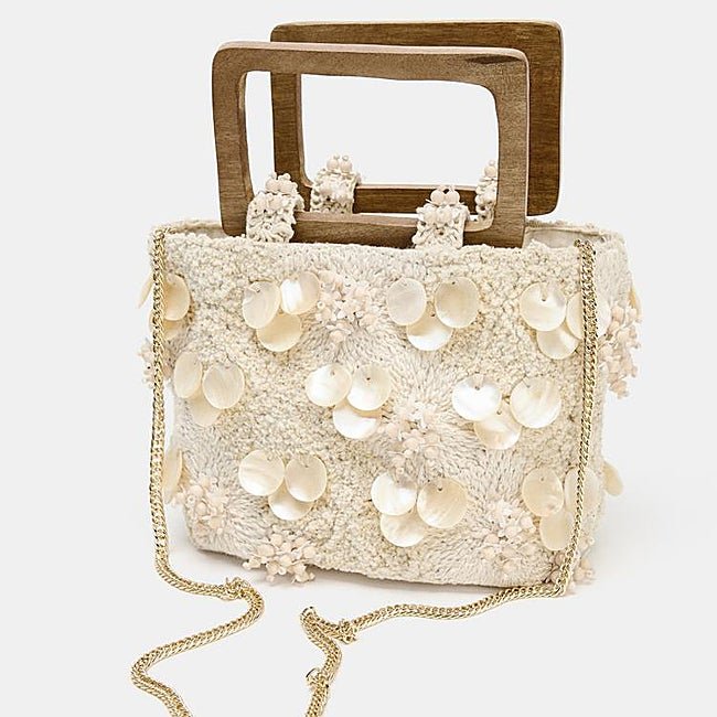 Bolso efecto nacarado de Zara (29,99 euros)