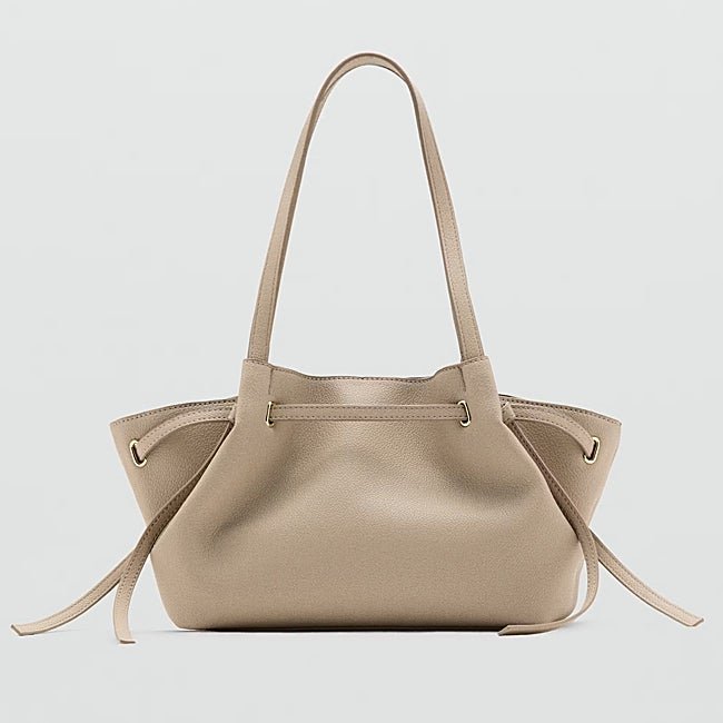 Bolso blanco roto de Mango (35,99 euros)