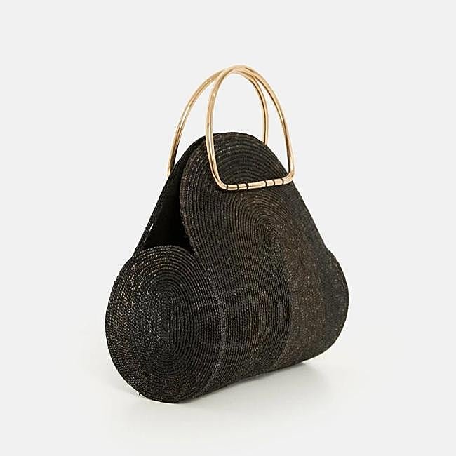 Bolso de mano trenzado en negro de Nana Golmar