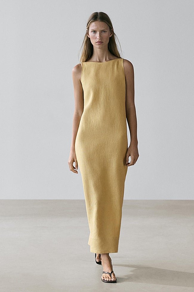 Vestido amarillo de Massimo Dutti (79,99 euros)