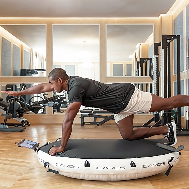 Ejercicio de estabilidad sobre plataforma inestable en ZEM Wellness Clinic Altea.