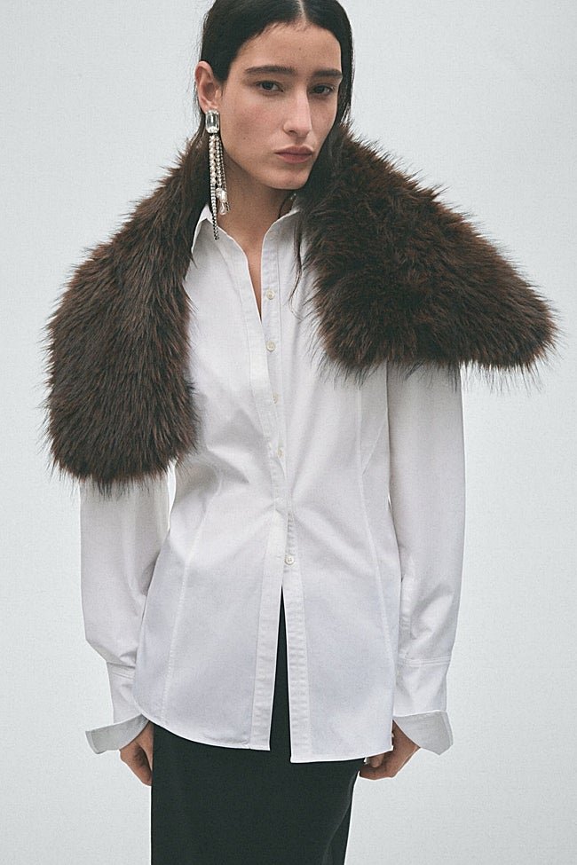 Camisa blanca de H&M (79,99 euros)